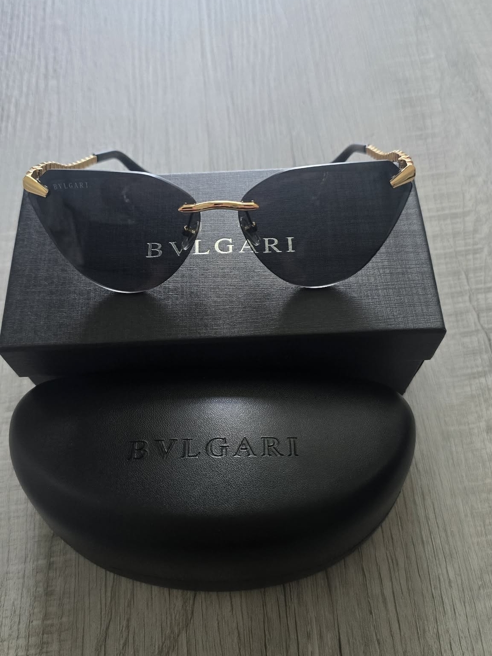 Bulgari Rimless Sunglasses with Black Lenses and Gold Accents